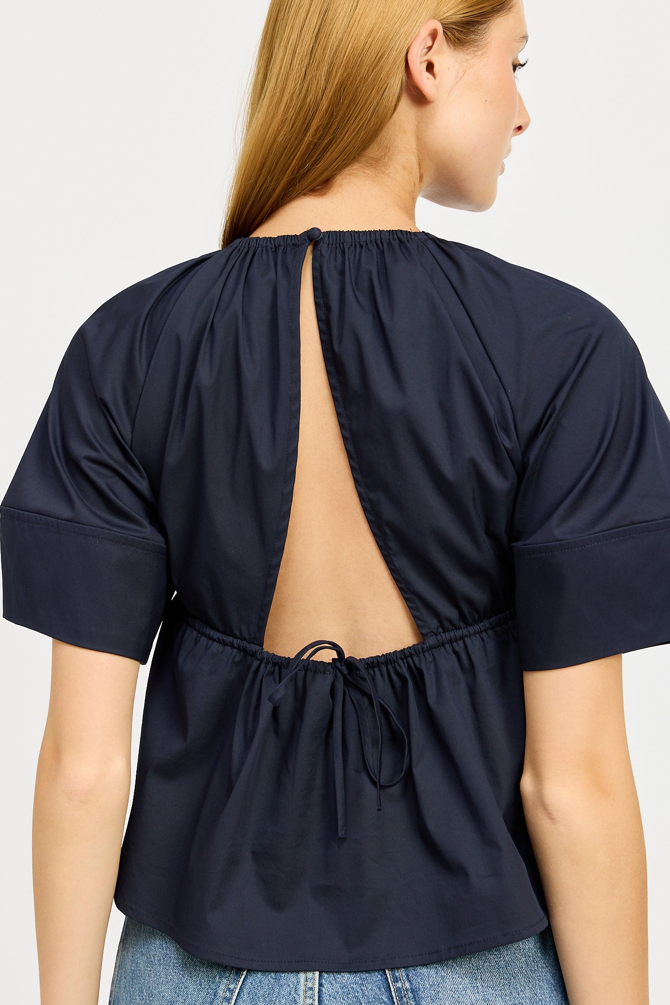 NAVY OPEN BACK BLOUSE