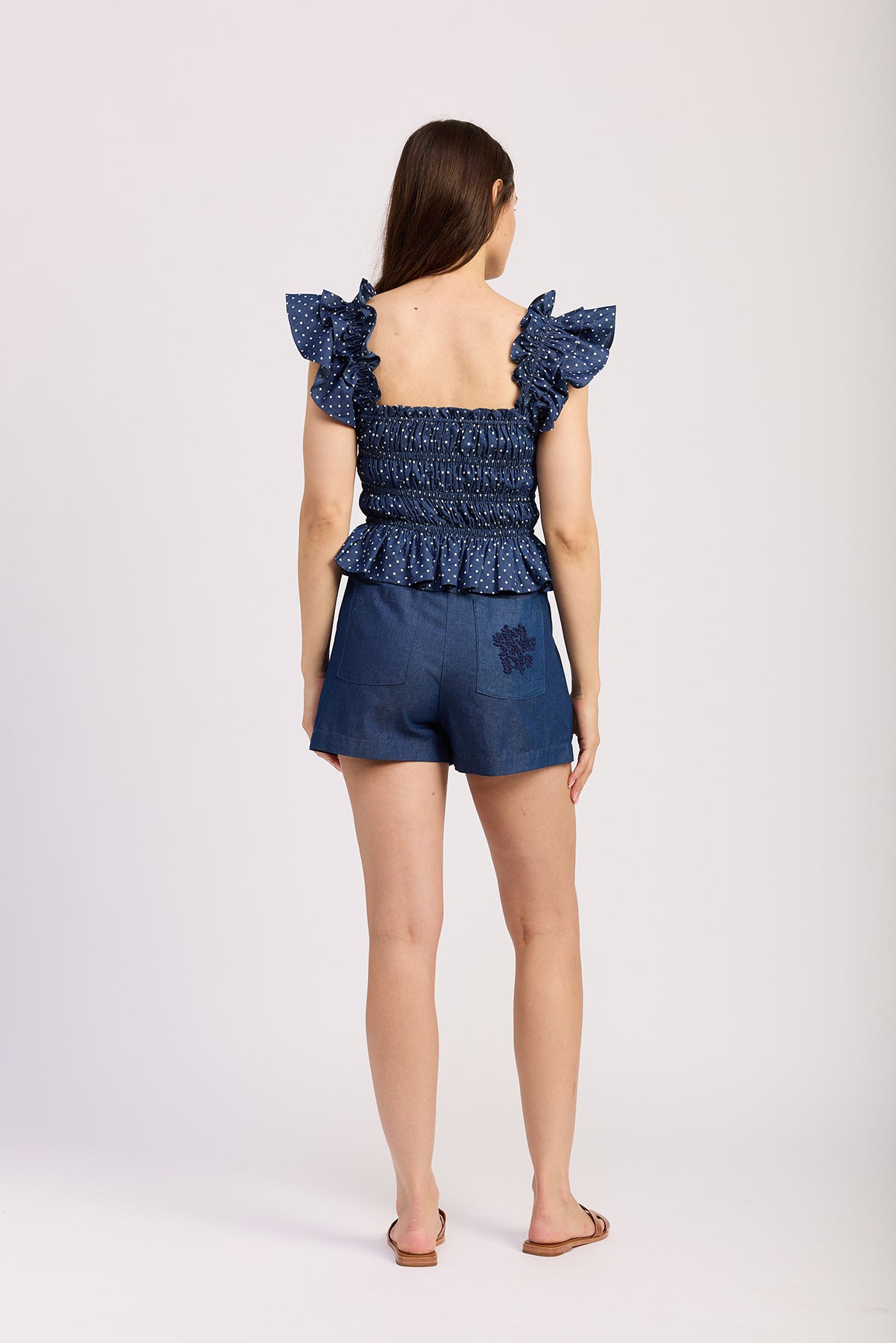 NAVY PEPLUM TOP