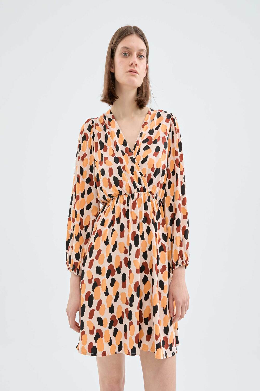 ORANGE PRINT SHORT CROSS-OVER MINI DRESS