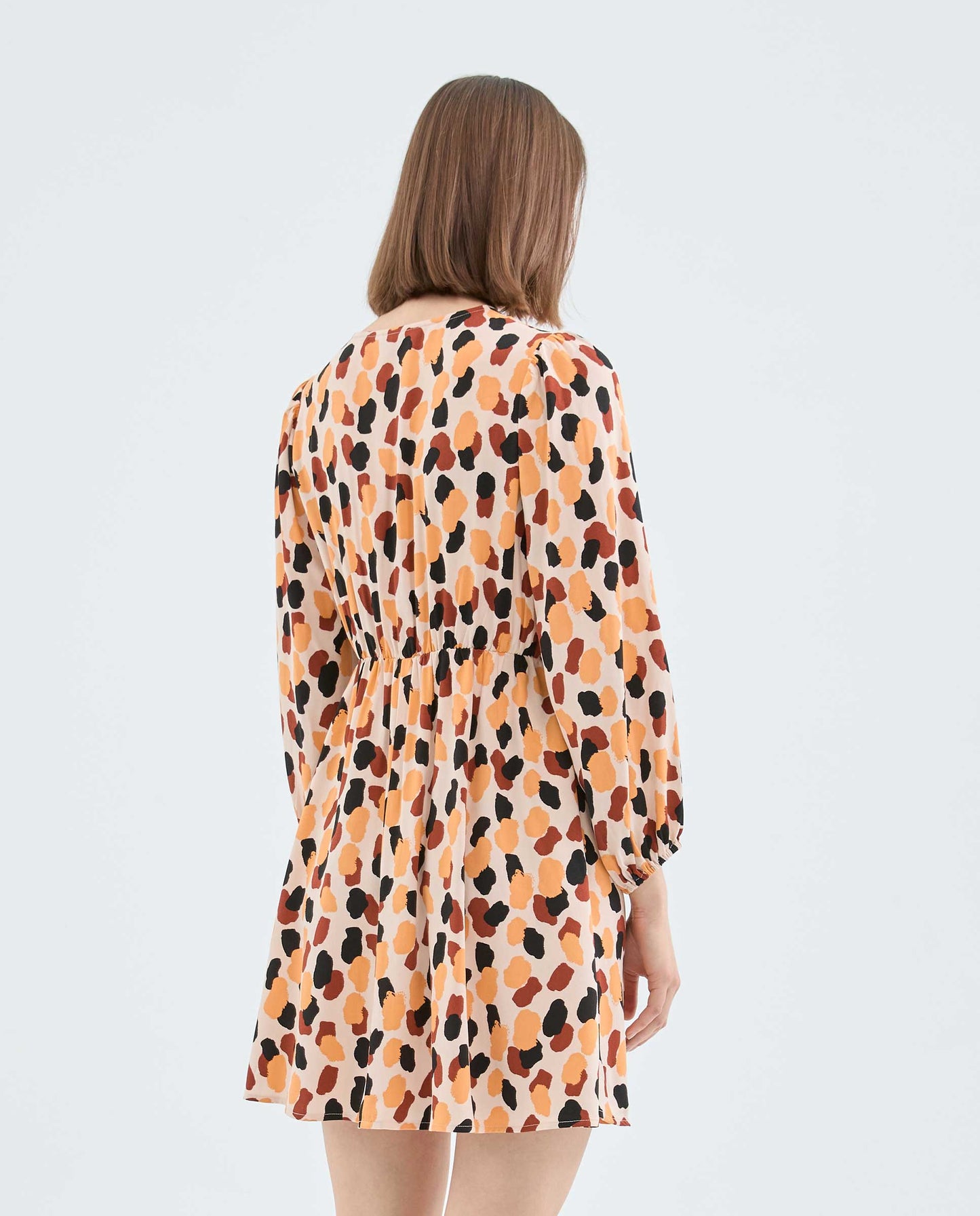 ORANGE PRINT SHORT CROSS-OVER MINI DRESS